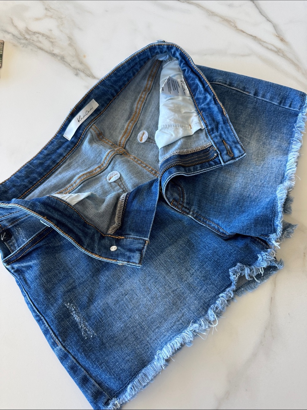 KanCan Women’s Blue Denim cut off shorts